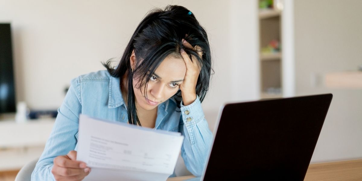 Woman looking at laptop